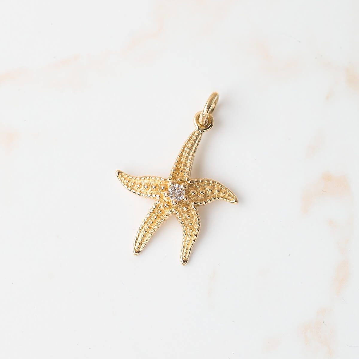 Seestern-Anhänger mit Brillant, Goldschmuck
